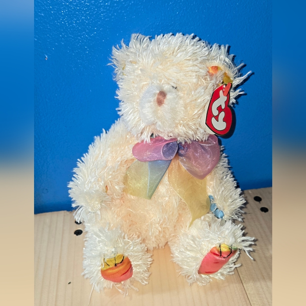 Retired and in Excellent Condition TY Carmella Plush with Rainbow Bow